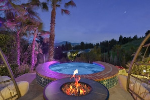 Warm up by the firepit on chilly evenings after your sojourn in the spa