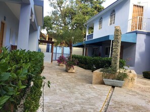 Looking from the pool to the front of the property.