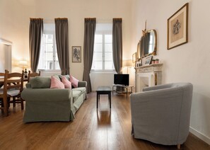 Living room with sofa and armchair