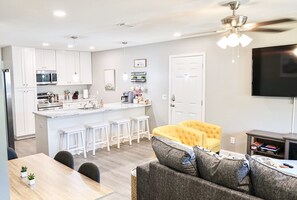 Have a home-cooked meal with seating for 4 at the bar and 4 at the table