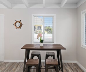 Cozy dining area with charming nautical touches.