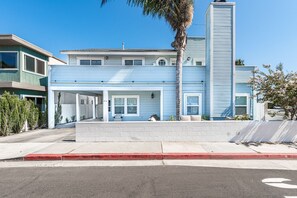 Street view of the property. This home includes 1-2 reserved parking spaces in the carport (small to mid-size vehicles recommended).
                