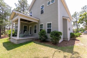 Enjoy a glass or wine or ice tea on the private back porch.