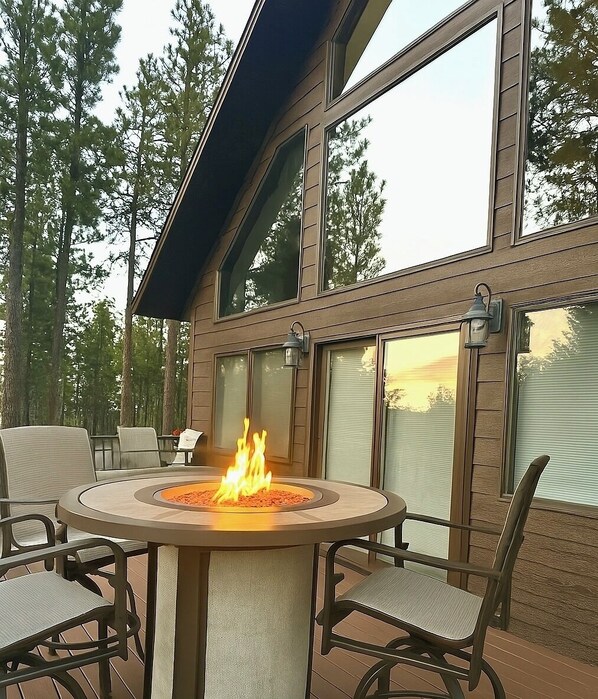 Peaceful nights, warm fire, and forest views from the deck.