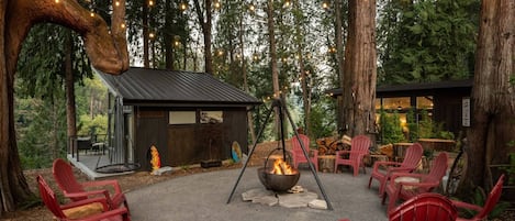 Shared Fire-Pit sits behind the Zen Den for all property guests.