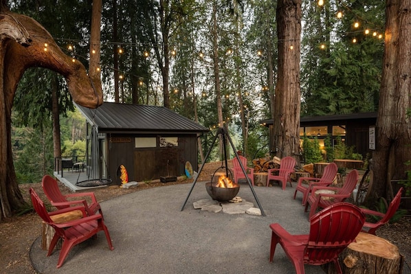 Shared Fire-Pit sits behind the Zen Den for all property guests.