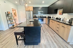 Prepare a meal for the whole group using this well-appointed kitchen.