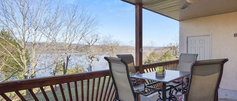 Beautiful lake view from back deck with outdoor seating