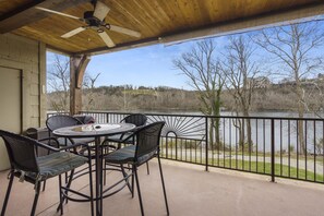 Lake view from back deck with outdoor seating