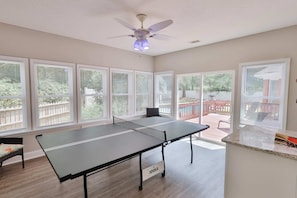Our amazing gameroom complete with a pong table and access to the pool!