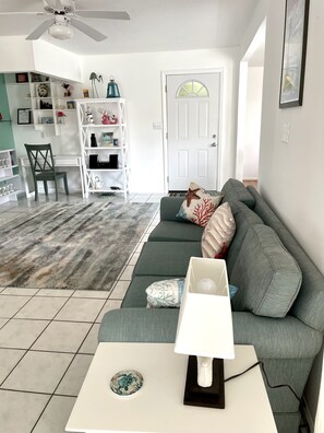 Extra sofa in living area for talking while others watch TV