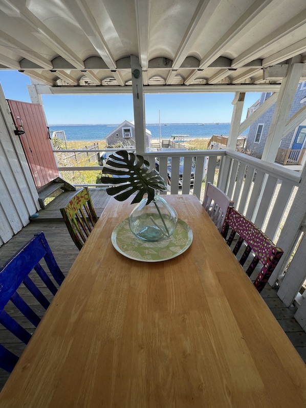 Covered porch with direct water views.  