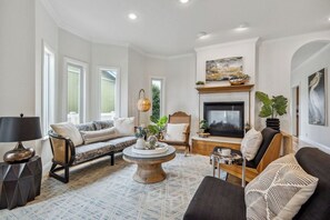 Enjoy your time with family and friends in our downstairs living room.