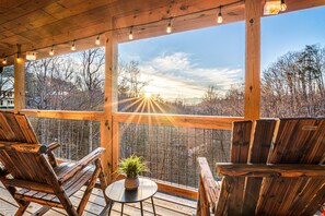 Your small to do list: Coffee right here every morning. Upper level deck has al fresco dining, nestled in the trees with long range mountain views.