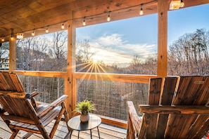 Your small to do list: Coffee right here every morning. Upper level deck has al fresco dining, nestled in the trees with long range mountain views.