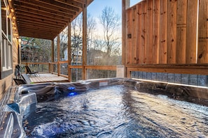 The hot tub offers a serene and private oasis. Plug in the deck lights too! Float into your vacation right here.