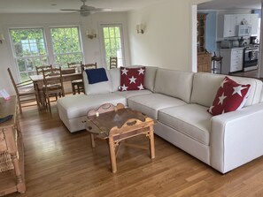 An amazing Family room and main eating area with 55" Smart TV - Sony