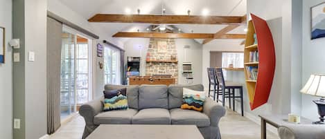 high vaulted, beamed ceilings really sets off this open floor plan