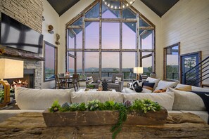 Twilight Reverie: Embrace the dusky hues as evening falls, in a living room where comfort is paramount, and every sunset is a private showing. 