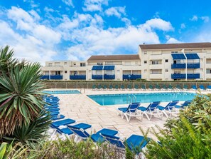 Plant, Sky, Cloud, Water, Building, Swimming Pool, Azure, Outdoor Furniture, Condominium, Urban Design