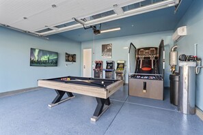 Fully loaded game room!  Pool/Ping Pong/Pop a shot, darts, 65" TV, 3 arcade games and AC!!!
