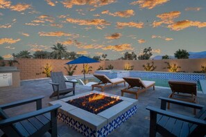 Stunning sunset view from the poolside with fire pit