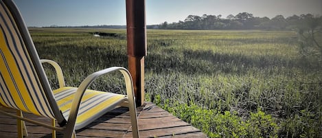 Lower Deck. Sits just feet from the marsh. Perfect spot for morning coffee.