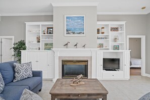 Watch the flames of the fire or some TV while in the formal living room!