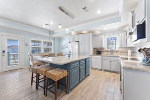 This spacious kitchen is fully stocked and ready for your group gathering.