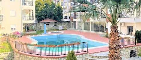 View of the communal pool from the  homes  1st floor balcony 