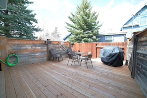 Spend a night out on the back patio, fenced in and complete with a great BBQ.