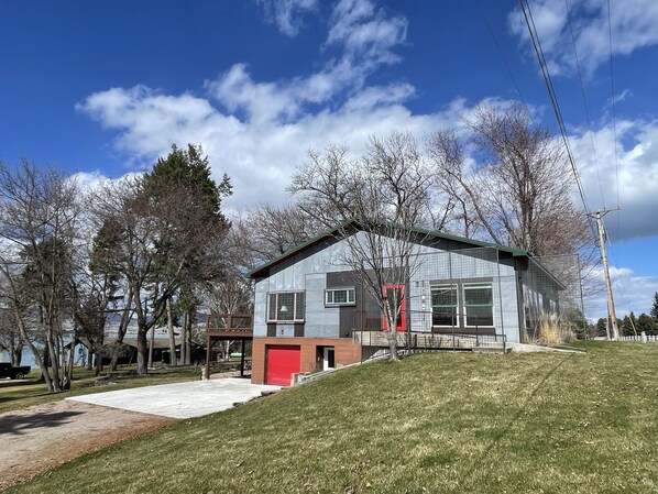 Located on Polson Bay Golf course and just steps to the lake and boat dock.