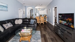 New Flooring! Open living space with Smart TV, board games, and screened balcony access