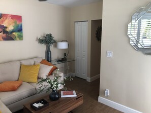 Around the corner is the bathroom & the hallway to the bedroom/kitchenette area