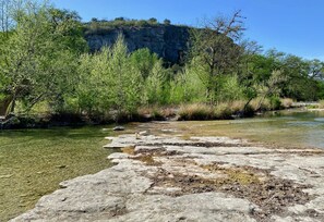 On the Rocks - Where On the Rocks cabin meets the Frio River!