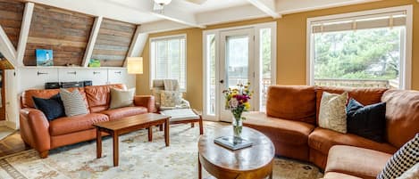 Spacious second floor living room with plenty of seating.