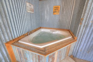 Large jetted tub for soaking your cares away.