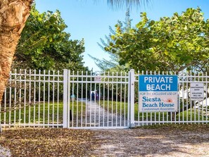 Private gate to enter the beach, next to our building. 