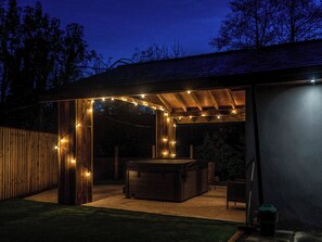 Hot tub area during the evening | Ty Afon Arch - Ty Afon, Garnant, near Ammanford