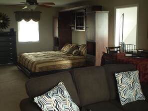 The Orchid Room with King sized Murphy bed and queen sized sofa bed.