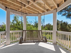 Sit out on the Porch Swing with a cup of coffee or a cool drink.