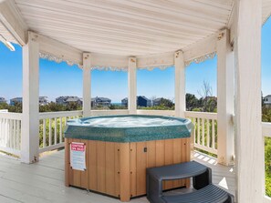 Relax in the bubbly Hot Tub in the Gazebo.