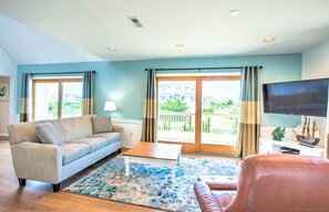 Relax in the beautiful Living Area with lots of natural light.