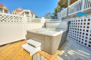 Enjoy the luxuries of your 6-person Hot Tub and own Private Swimming Pool with colorful Adirondack Furniture.