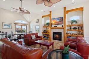 Spend your afternoons in the Living Area with your favorite movie. (*Please Note: The fireplace is not for guest use)