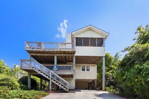 This 5-Bedroom, 3-Bathroom Oceanside home in Corolla combines the elegance of modern living with the charm of a coastal cottage.