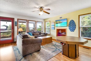 The Mid-Level Living Area is fantastic for relaxing and watching your favorite shows or playing a game together!
