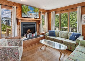 Relax in the spacious Living Area and gather together for family movie night! Please Note: The fireplace is not for guest use.