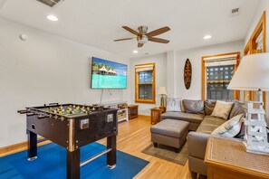 Foosball table and another T.V area