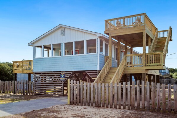 This 4-Bedroom, 3-Bathroom oceanside residence in the heart of Kitty Hawk is a dog-friendly vacation rental home that welcomes your four-legged friends to accompany you on your escape to this island paradise.